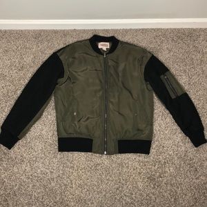 Green and black bomber jacket